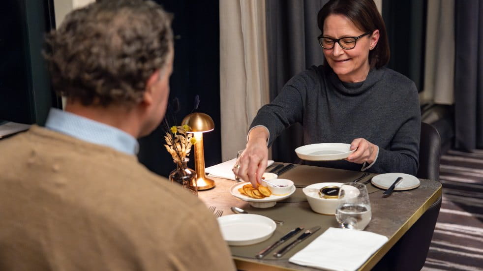 Couple dining on a Hurtigruten cruise